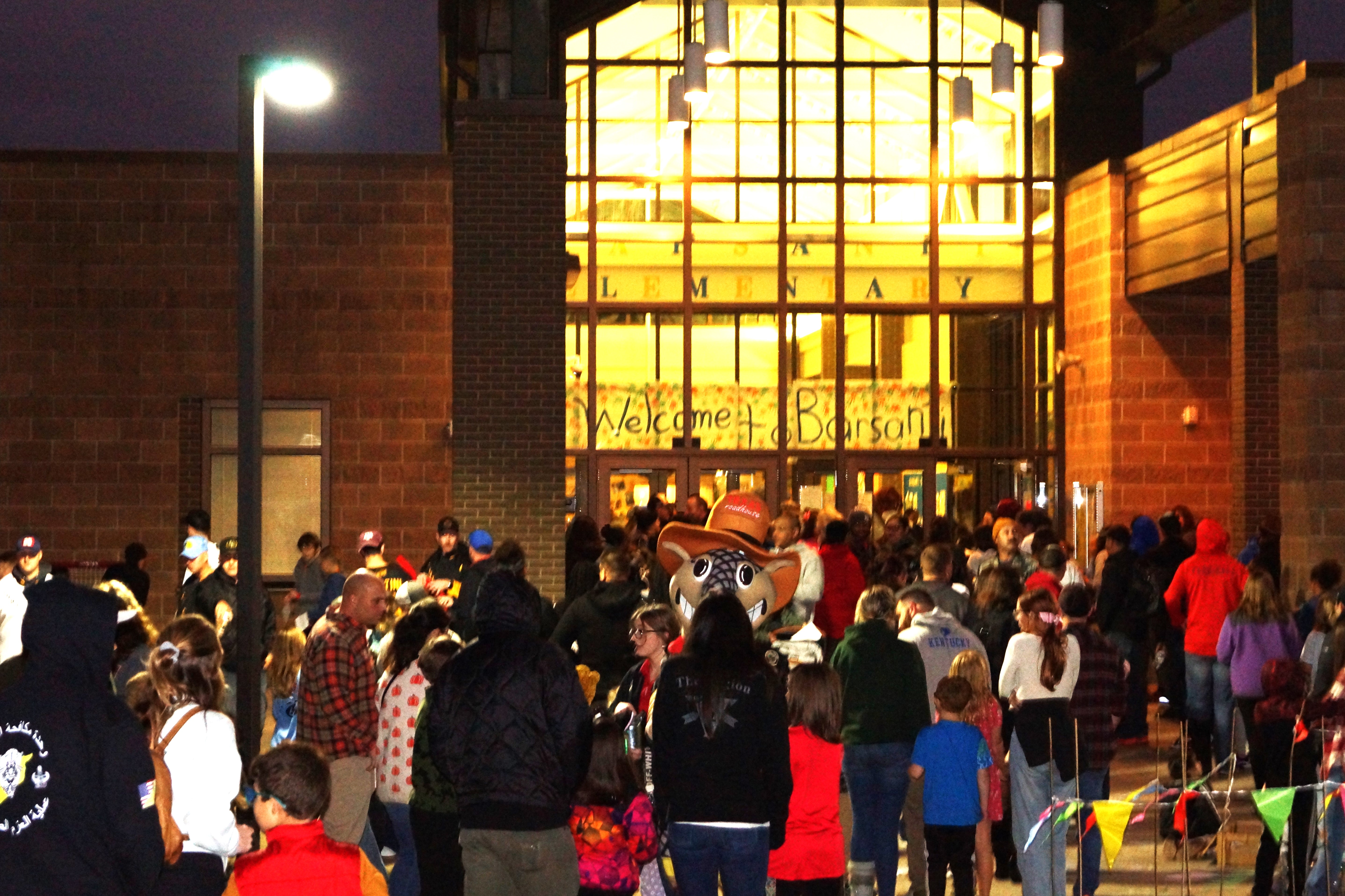 Families eagerly gather for a fun-filled evening in celebration of Fall Fest.